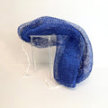 Blue net sponge draped over a stand 